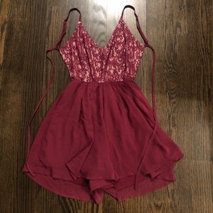 Romper with flare shorts and open back